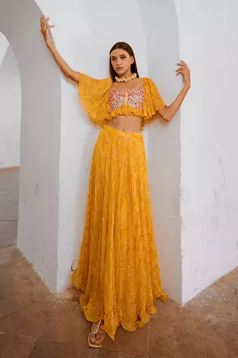 Gulbahar marigold yellow  jugnu sitara butterfly blouse with flair skirt set.