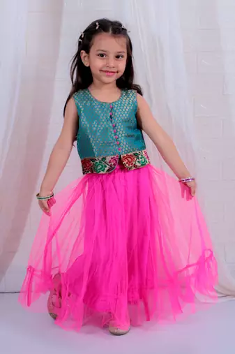 pink net lehenga and green brocade blouse set