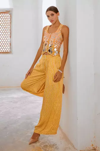 Marigold yellow tussar silk sheesha koti & loose pant set.