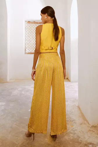 Marigold yellow tussar silk sheesha koti & loose pant set.