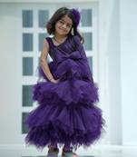 Purple colored ruffle gown for party  