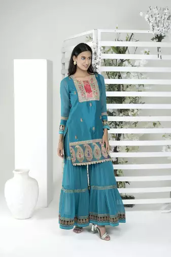 Nikhaar blue embroidered art silk straight cut kurta & Only