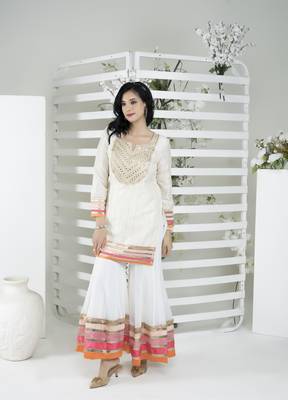 Nikhaar off-white embroidered art silk straight cut kurta & Only 3