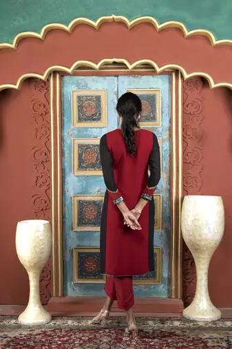 Nikhaar maroon embroidered georgette straight cut kurta & pants  set
