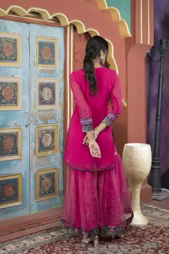 Nikhaar pink embroidered georgette straight cut kurta & sharara set
