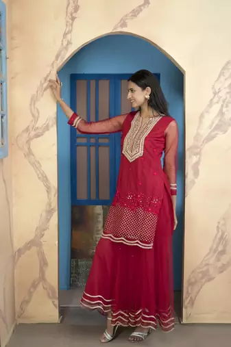 Nikhaar pink embroidered net straight cut kurta & sharara set
