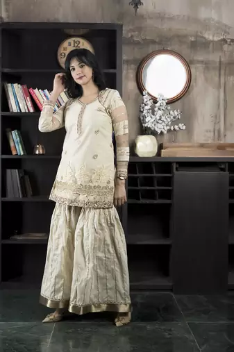 Nikhaar beige embroidered net straight cut kurta & sharara set