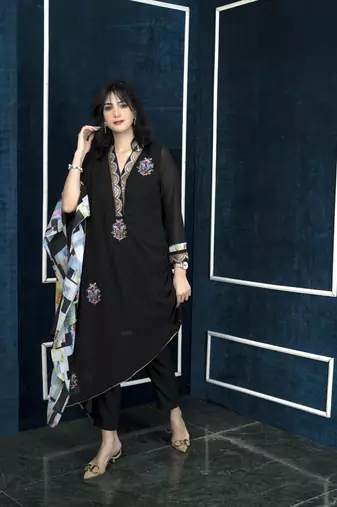 Nikhaar black embroidered georgette asymmetrical kurta & pants set