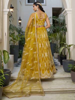 yellow thread work net lehenga set choli with dupatta 3