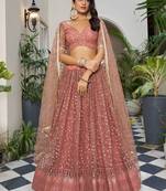 Bewitching Dusty Pink Thread Work Net Engagement Wear Lehenga Choli