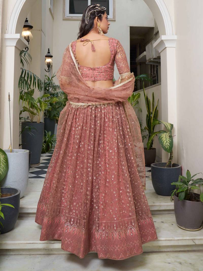 Bewitching Dusty Pink Thread Work Net Engagement Wear Lehenga Choli