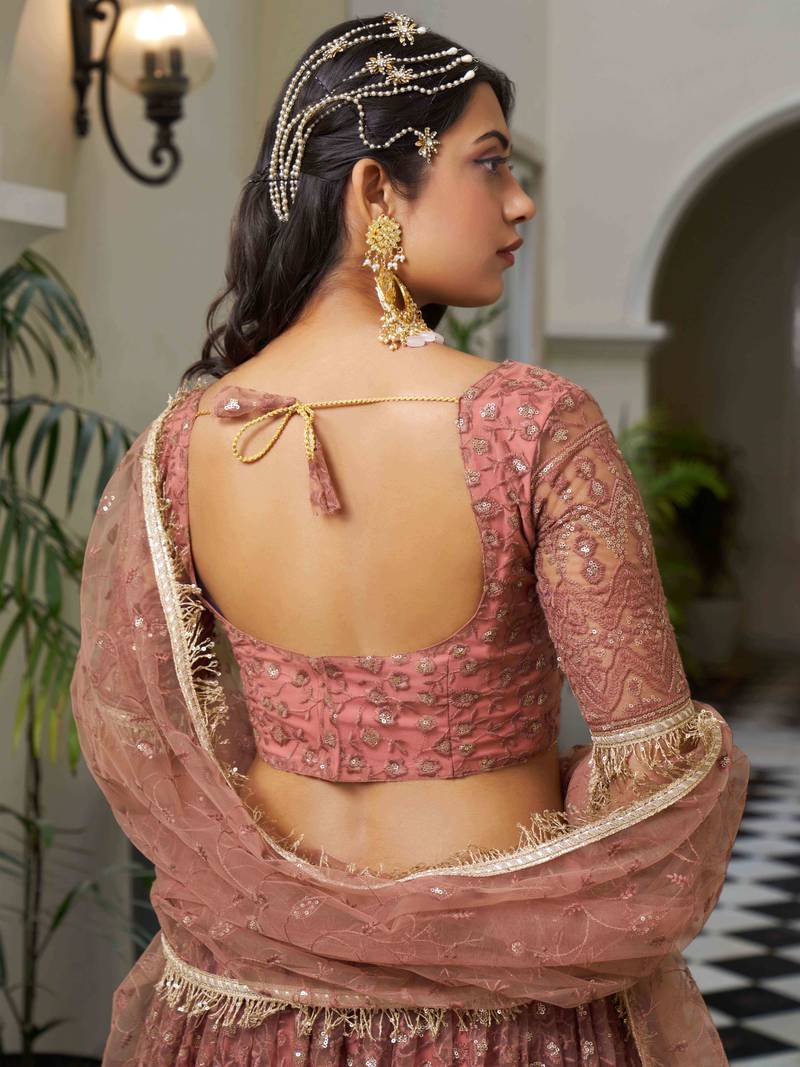 Bewitching Dusty Pink Thread Work Net Engagement Wear Lehenga Choli
