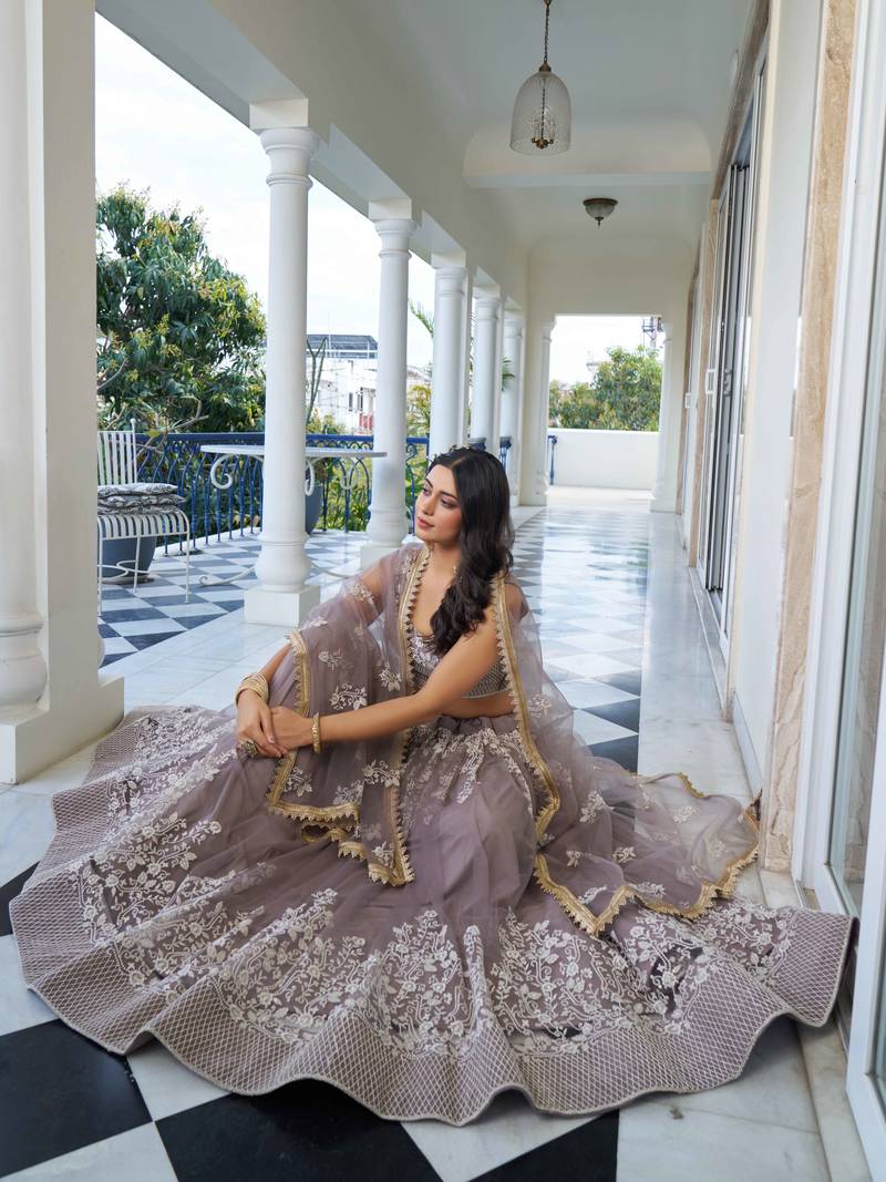 Mesmerizing Grey Thread Work Net Sangeet Wear Lehenga Choli