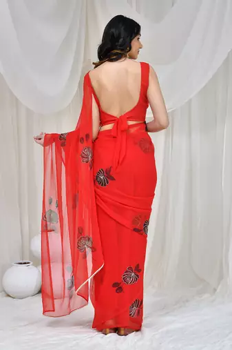 Red hand-painted & aari embroidered georgette saree with stiched blouse