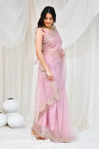 Rose gold embroidered organza saree with  stiched blouse