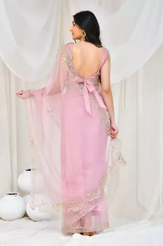 Rose gold embroidered organza saree with  stiched blouse