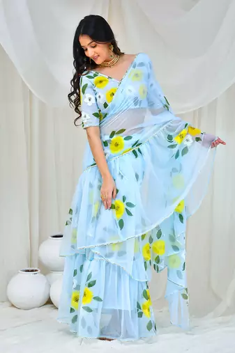 Sky blue hand painted georgette lehenga saree with stiched blouse