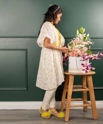 Yellow and white straps top and bird embroidered tie up white jacket and scalloped hem pant 3