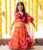 Orange and pink organza printed floral lehenga with one-shoulder blouse
