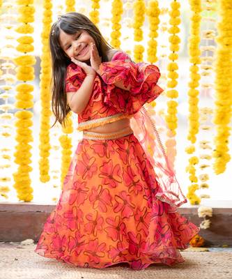 Orange and pink organza printed floral lehenga with one-shoulder blouse 2