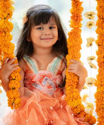 Orange net embroidered sequin frilled lehenga with floral cutwork crop top 4
