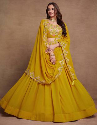 Yellow Sequined Embroidered work Faux Georgette Fabric Flared Lehenga Choli with Dupatta. 1