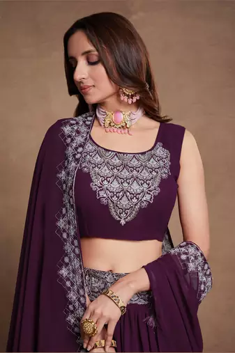 Purple Sequined Embroidered work Faux Georgette Fabric Flared Lehenga Choli with Dupatta.