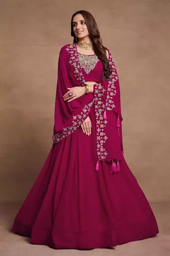 Pink Sequined Embroidered work Faux Georgette Fabric Flared Lehenga Choli with Dupatta.