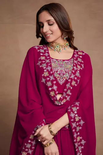 Pink Sequined Embroidered work Faux Georgette Fabric Flared Lehenga Choli with Dupatta.