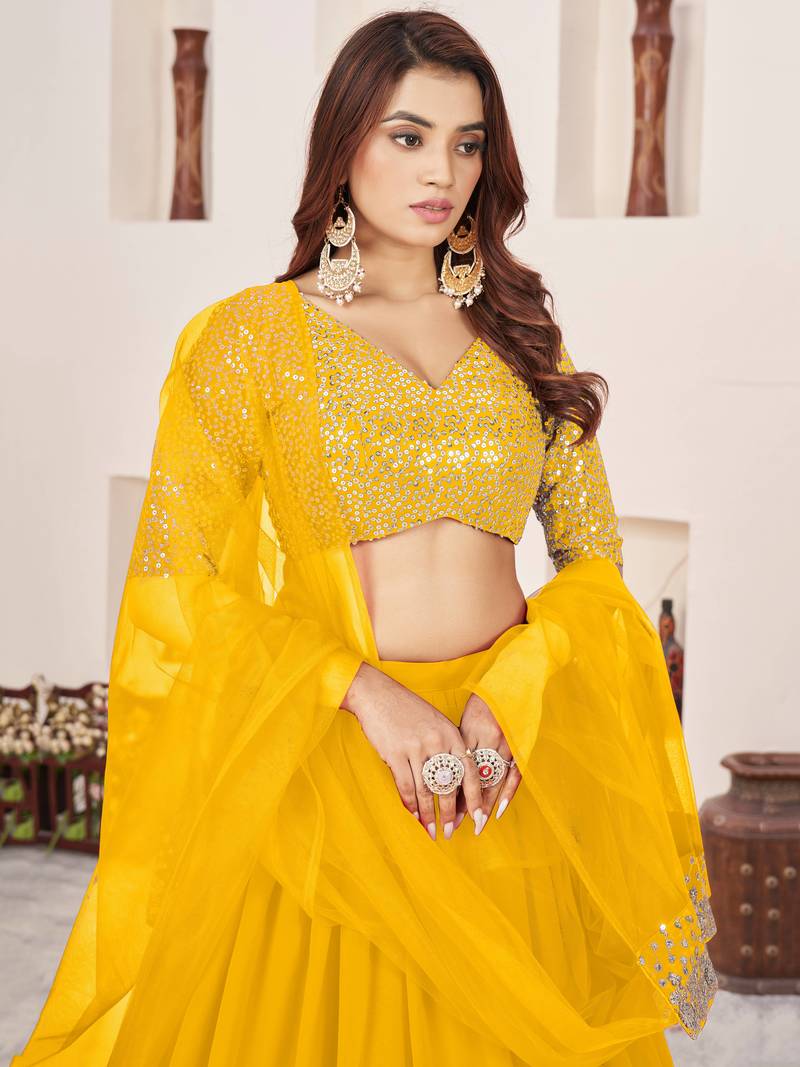 Incredible Yellow Sequins Georgette Engagement Wear Lehenga Choli