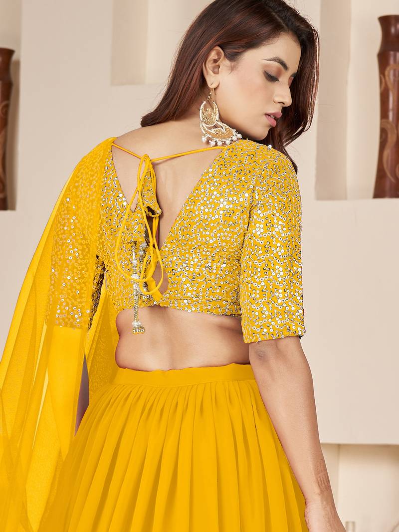 Incredible Yellow Sequins Georgette Engagement Wear Lehenga Choli