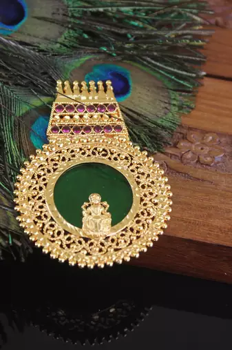 Kerala style gold plated temple palakka pendant
