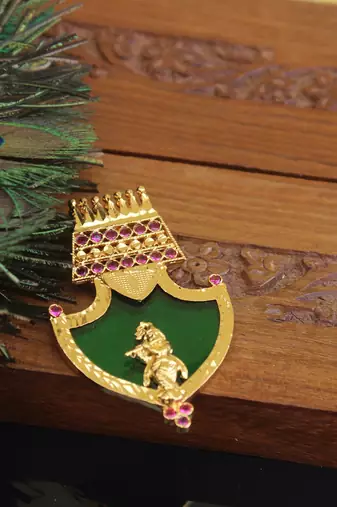 Kerala style gold plated krishna palakka pendant