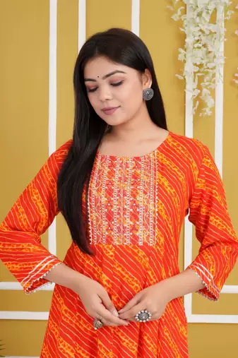 Red colour traditional lehenriya style printed long kurti with gota patti 