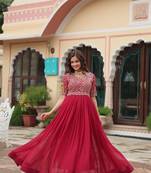 Pink colour beautifully embroidered zari and sequins work rich looks heavy evening gown