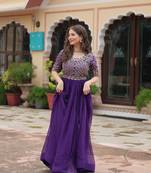 Purple colour beautifully embroidered zari and sequins work rich looks heavy evening gown