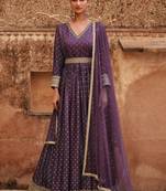 Purple embroidered jacquared silk free size stitched gown. (size upto 42)