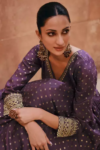 Purple embroidered jacquared silk free size stitched gown. (size upto 42)