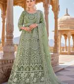 Pista green embroidered net semi stitched anarkali churidar suit.