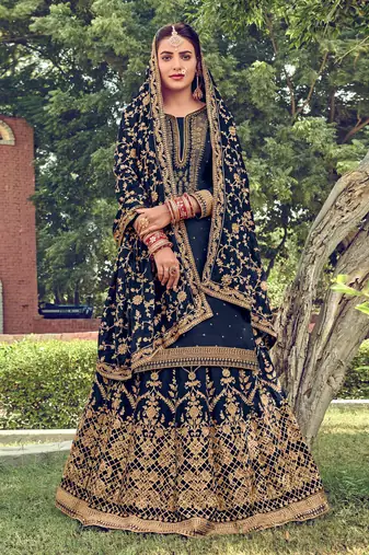 Blue embroidered upada silk semi stitched straight lehenga suit.