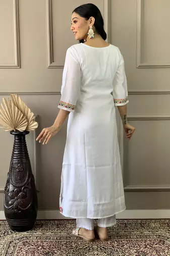 Beautifully off white colour chanderi fabric girlie partywear embroidered suit