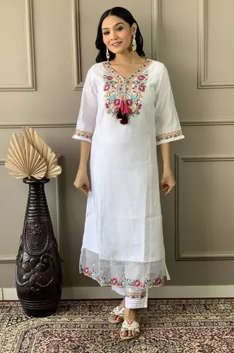 Beautifully off white colour chanderi fabric girlie partywear embroidered suit