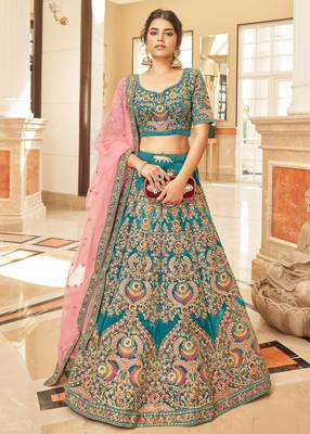 Alluring Teal Blue Thread Zari Dori And Sequins Embroidered Velvet Bridal Wear Lehenga Choli For Women 5