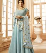 Blue embroidered linen silk semi stitched anarkali churidar suit