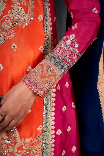 Orange-red embroidered chinon silk salwar suit