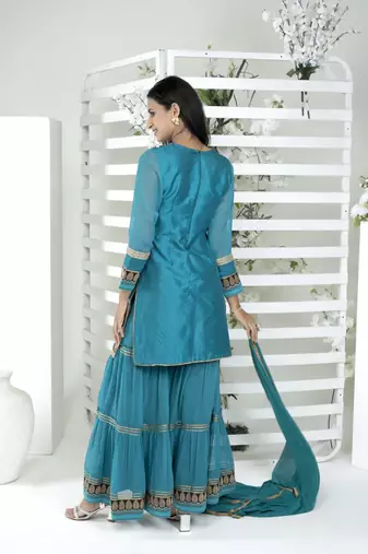 Nikhaar blue art silk stitched straight cut sharara kurta & dupatta 