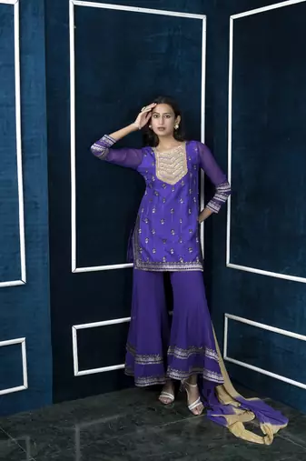 Nikhaar purple art silk stitched straight cut sharara kurta & dupatta 