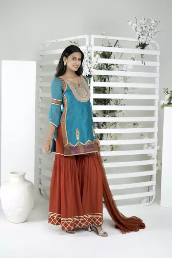 Nikhaar blue art silk stitched straight cut sharara kurta & dupatta 