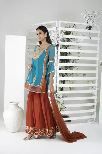 Nikhaar blue art silk stitched straight cut sharara kurta & dupatta 