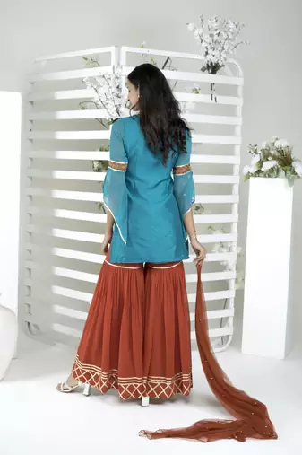 Nikhaar blue art silk stitched straight cut sharara kurta & dupatta 